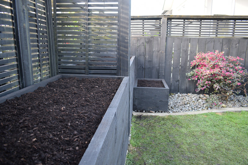 Planter staged with fresh edible plantings